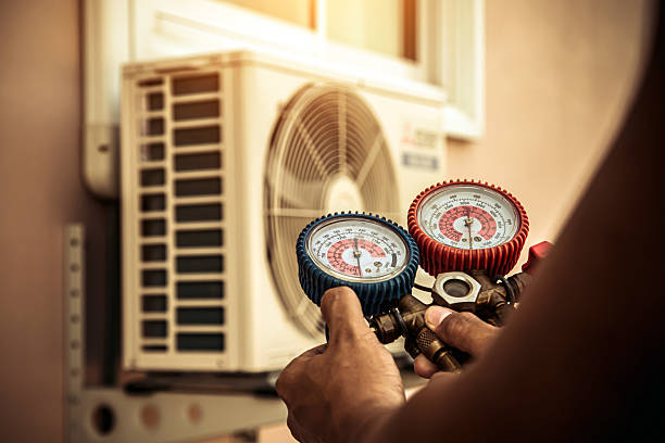Professional Hvac technician working in Harrah, OK